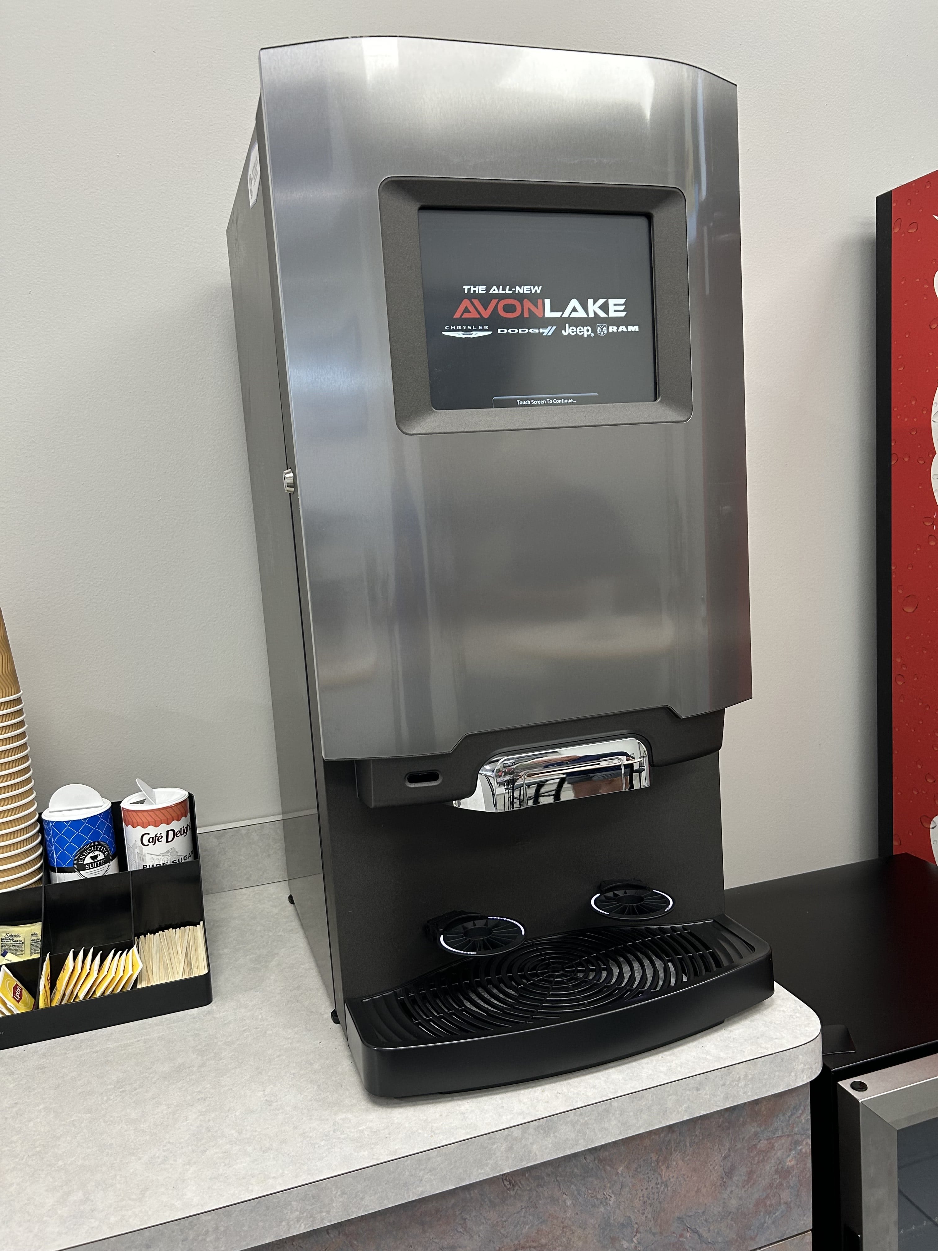 Compact coffee machine with digital display and cup holder
