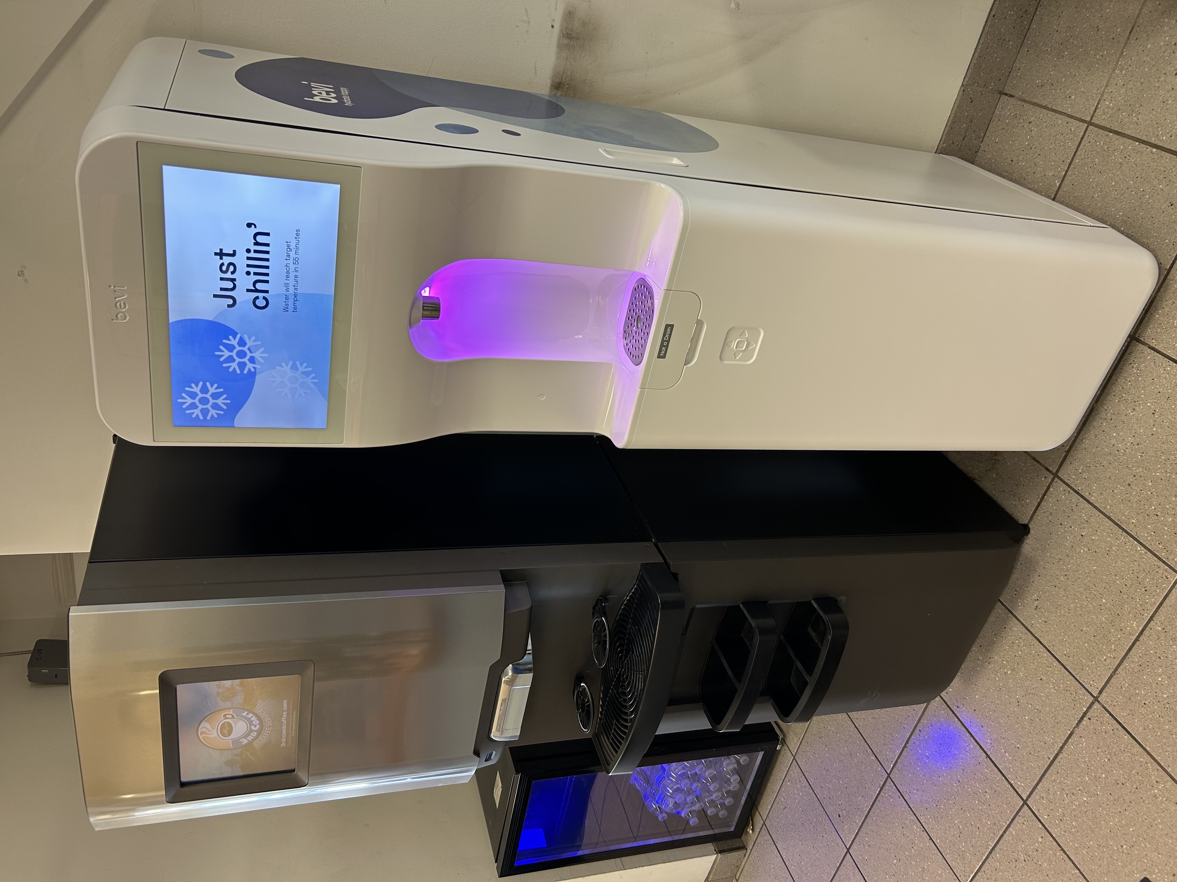 Side-by-side coffee and water dispensing machines