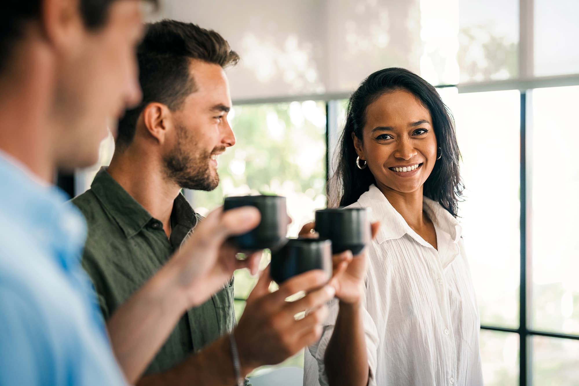 A group of people drinking coffee